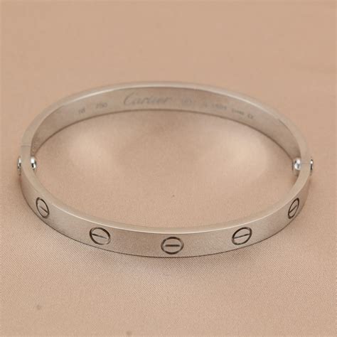 nuovo bracciale love cartier ol4783|cartier love bracelet serial numbers.